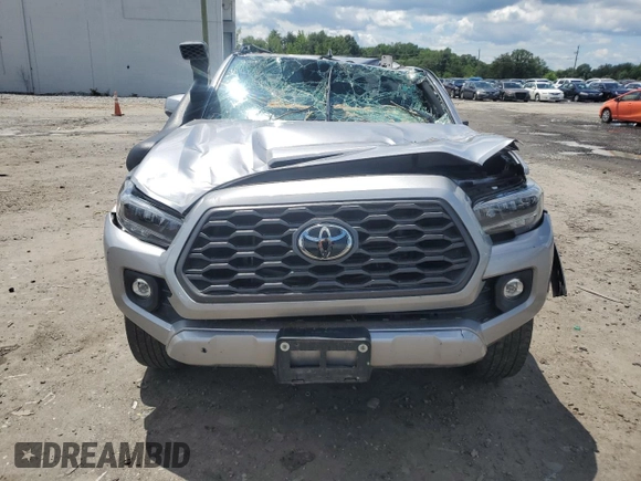 2020 Toyota Tacoma SR5 with VIN 3TMDZ5BN5LM090020, listed as a Copart auction lot 58192835 with 107,156 mi miles and Salvage title. Bid and sale history available at DreamBid. Image 5.