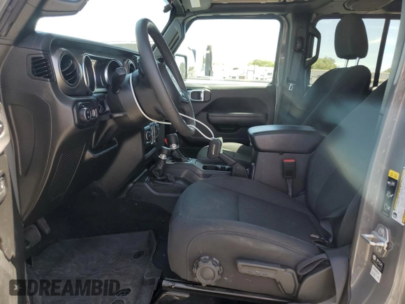 2023 Jeep Gladiator Sport S with VIN 1C6HJTAG3PL552959, listed as a Copart auction lot 56905635 with 30,356 mi miles and Salvage title. Bid and sale history available at DreamBid. Image 7.
