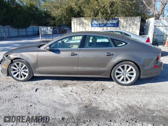 2016 Audi A7 3.0 Premium Plus with VIN WAUWGAFC2GN105498, listed as a IAAI auction lot 41488062 with 120,393 mi miles. Bid and sale history available at carsss.com. Image 14.