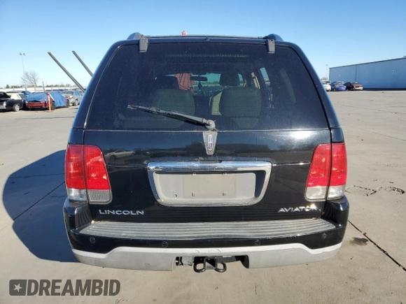 2003 Lincoln Aviator Premium z VIN 5LMEU78H63ZJ21718, wystawiony jako Copart lot #89216575 z przebiegiem 182 697 mil mil oraz Szkoda całkowita • Salvage title. Historia ofert i sprzedaży dostępna na DreamBid. Obrazek 6.