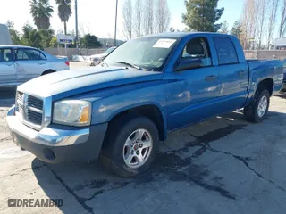 2005 Dodge Dakota SLT with VIN 1D7HE48K85S218934, listed as a IAAI auction lot 41514011 with 122,063 mi miles. Bid and sale history available at carsss.com. Image 2.