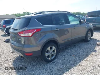 2013 Ford Escape SE with VIN 1FMCU0GX6DUB29519, listed as a IAAI auction lot 42281464 with 129,671 mi miles and . Bid and sale history available at DreamBid. Image 4.