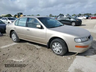 1995 Nissan Maxima GLE с VIN JN1CA21D1ST067119, выставлен на аукционе Copart как лот 53255025 с пробегом 74 851 миль миль и На запчасти • Non repairable. История ставок и продаж доступна на DreamBid. Изображение 4.