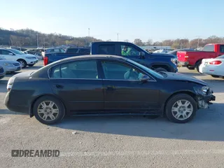 2005 Nissan Altima 2.5 S with VIN 1N4AL11DX5N496959, listed as a IAAI auction lot 41801631 with 190,433 mi miles. Bid and sale history available at carsss.com. Image 14.