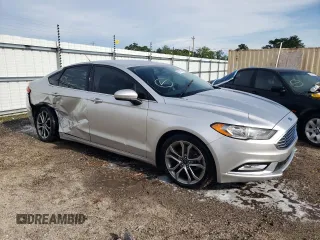 2017 Ford Fusion SE z VIN 3FA6P0H76HR184188, wystawiony jako Copart lot #60719075 z przebiegiem 105 377 mil mil oraz Czysty tytuł • Clean title. Historia ofert i sprzedaży dostępna na DreamBid. Obrazek 4.