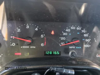 2004 Jeep Wrangler Sport z VIN 1J4FA49S64P751615, wystawiony jako Copart lot #55810895 z przebiegiem 128 165 mil mil oraz Szkoda całkowita • Salvage title. Historia ofert i sprzedaży dostępna na DreamBid. Obrazek 9.