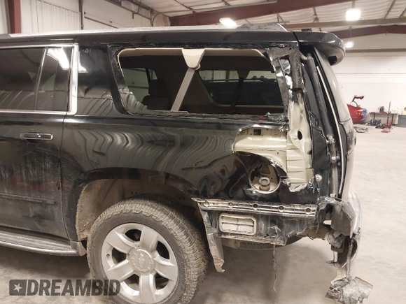 2017 Chevrolet Suburban Premier z VIN 1GNSKJKC0HR250854, wystawiony jako IAAI lot #41541476 z przebiegiem 128 231 mil mil oraz . Historia ofert i sprzedaży dostępna na DreamBid. Obrazek 6.