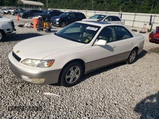 1999 Lexus ES 300 with VIN JT8BF28G6X5058615, listed as a Copart auction lot 63405785 with 116,016 mi miles and Salvage title. Bid and sale history available at DreamBid. Image 1.