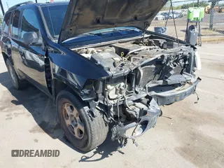 2004 GMC Envoy SLE with VIN 1GKDS13S942294303, listed as a IAAI auction lot 41992547 with 196,444 mi miles. Bid and sale history available at carsss.com. Image 14.