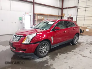 2016 Cadillac SRX Performance Collection z VIN 3GYFNCE32GS571230, wystawiony jako IAAI lot #42417263 z przebiegiem 59 634 mil mil oraz . Historia ofert i sprzedaży dostępna na DreamBid. Obrazek 2.