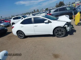 2014 Toyota Corolla L with VIN 5YFBURHE7EP049355, listed as a IAAI auction lot 42073330 with 129,605 mi miles and . Bid and sale history available at DreamBid. Image 14.