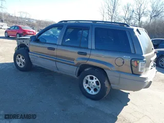 1999 Jeep Grand Cherokee Laredo with VIN 1J4GW58NXXC623753, listed as a IAAI auction lot 41685540 with 190,134 mi miles. Bid and sale history available at carsss.com. Image 3.