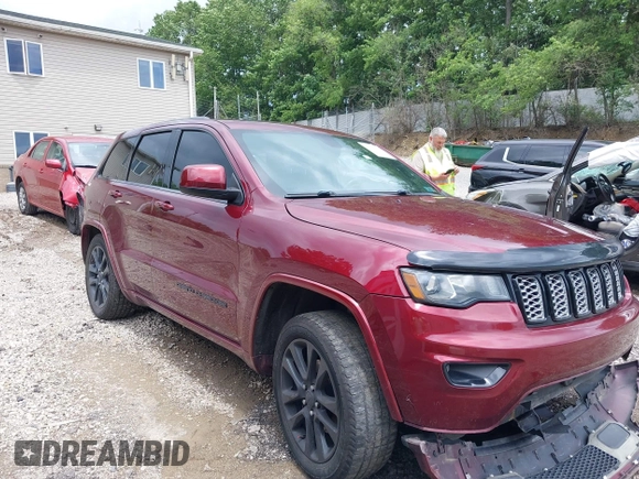 2017 Jeep Grand Cherokee Altitude with VIN 1C4RJFAG0HC700419, listed as a IAAI auction lot 42553449 with 143,872 mi miles and . Bid and sale history available at DreamBid. Image 1.
