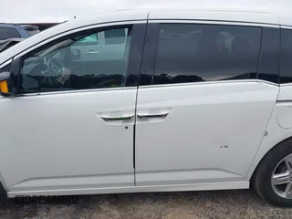 2012 Honda Odyssey Touring with VIN 5FNRL5H93CB034485, listed as a IAAI auction lot 42304502 with 198,589 mi miles and . Bid and sale history available at DreamBid. Image 14.