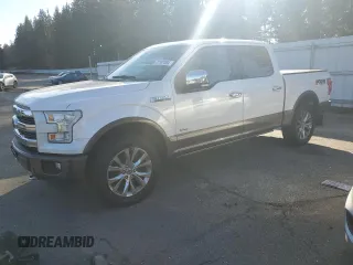 2015 Ford F-150 XLT with VIN 1FTEW1EG1FFC61935, listed as a Copart auction lot 47077015 with 127,798 mi miles and Salvage Title. Bid and sale history available at carsss.com. Image 1.