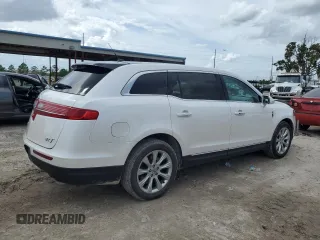 2014 Lincoln MKT with VIN 2LMHJ5FK5EBL57377, listed as a Copart auction lot 70608694 with 115,053 mi miles and Salvage Title. Bid and sale history available at DreamBid. Image 3.