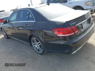 2015 Mercedes-Benz E-Class E 350 Luxury with VIN WDDHF8JB0FB112042, listed as a IAAI auction lot 41771389 with 135,191 mi miles. Bid and sale history available at carsss.com. Image 3.