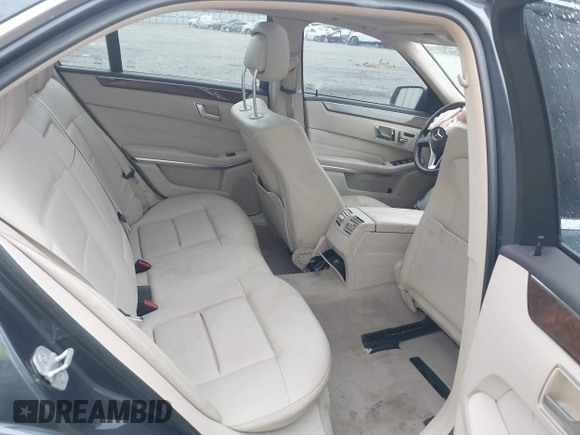 2014 Mercedes-Benz E 350 Sport with VIN WDDHF5KB7EA779952, listed as a IAAI auction lot 42308290 with 100,000 mi miles and . Bid and sale history available at DreamBid. Image 8.