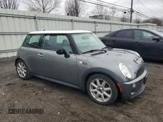 2005 MINI Hardtop S с VIN WMWRE33465TD90908, выставлен на аукционе Copart как лот 50671585 с пробегом Не указан миль и Списание • Salvage title. История ставок и продаж доступна на DreamBid. Изображение 4.