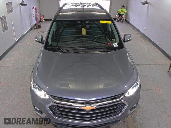 2021 Chevrolet Traverse LT Cloth z VIN 1GNEVGKW8MJ192048, wystawiony jako IAAI lot #42556137 z przebiegiem 106 304 mil mil oraz . Historia ofert i sprzedaży dostępna na DreamBid. Obrazek 23.