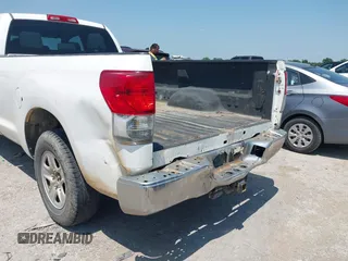2010 Toyota Tundra SR with VIN 5TFTY5F19AX006696, listed as a IAAI auction lot 42379570 with 332,246 mi miles and . Bid and sale history available at DreamBid. Image 6.