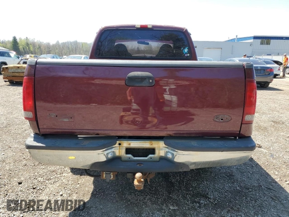 2000 Ford F-250 XL with VIN 1FTNX20F5YED86494, listed as a Copart auction lot 54193495 with 551,488 mi miles and Salvage title. Bid and sale history available at DreamBid. Image 6.
