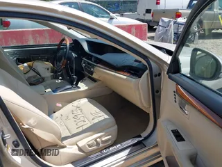 2014 Lexus ES 300h with VIN JTHBW1GG5E2047180, listed as a IAAI auction lot 42395421 with 103,262 mi miles and . Bid and sale history available at DreamBid. Image 5.