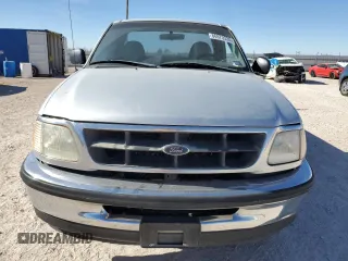 1998 Ford F-150 z VIN 1FTZF1762WKA87421, wystawiony jako Copart lot #86973334 z przebiegiem 217 978 mil mil oraz Szkoda całkowita • Salvage title. Historia ofert i sprzedaży dostępna na DreamBid. Obrazek 5.