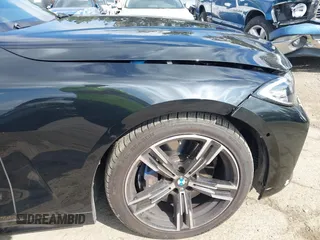2023 BMW 4 Series M440i with VIN WBA53AT09PCL49954, listed as a IAAI auction lot 41478951 with 27,105 mi miles and . Bid and sale history available at DreamBid. Image 18.