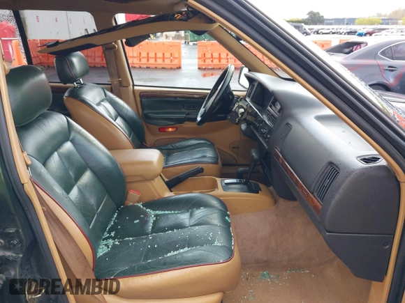 1996 Jeep Grand Cherokee Limited with VIN 1J4GZ78S0TC235692, listed as a IAAI auction lot 41945617 with Not provided miles and . Bid and sale history available at DreamBid. Image 5.