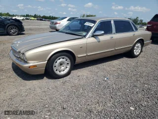 1999 Jaguar XJ with VIN SAJKD6042XC876937, listed as a Copart auction lot 66366064 with 121,747 mi miles and Clean Title. Bid and sale history available at carsss.com. Image 1.