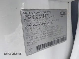 2020 Audi Q3 Premium with VIN WA1AECF35L1030273, listed as a IAAI auction lot 42006553 with 81,944 mi miles. Bid and sale history available at carsss.com. Image 9.