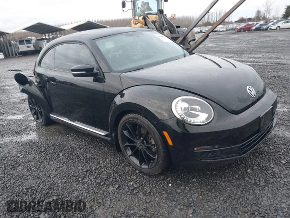 2014 Volkswagen Beetle 2.5L w/Sun with VIN 3VWJP7AT3EM608906, listed as a IAAI auction lot 41501830 with 42,804 mi miles and . Bid and sale history available at DreamBid. Image 1.