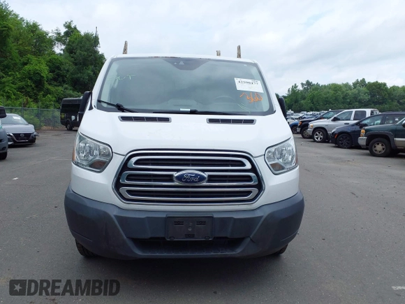 2016 Ford Transit Cargo z VIN 1FTYR2ZM6GKA03946, wystawiony jako IAAI lot #42590477 z przebiegiem 163 710 mil mil oraz . Historia ofert i sprzedaży dostępna na DreamBid. Obrazek 12.