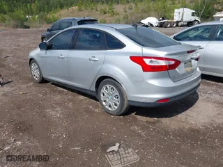 2012 Ford Focus SE with VIN 1FAHP3F22CL115877, listed as a IAAI auction lot 42031223 with 138,743 mi miles. Bid and sale history available at carsss.com. Image 3.