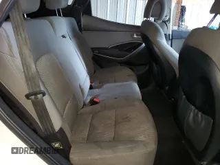 2016 Hyundai Santa Fe z VIN 5XYZTDLB8GG353853, wystawiony jako Copart lot #51740105 z przebiegiem 147 007 mil mil oraz Szkoda całkowita • Salvage title. Historia ofert i sprzedaży dostępna na DreamBid. Obrazek 11.