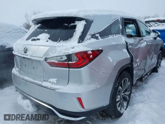 2018 Lexus RX 350L Premium z VIN JTJDZKCA9J2008933, wystawiony jako IAAI lot #41600527 z przebiegiem 93 423 mil mil oraz . Historia ofert i sprzedaży dostępna na DreamBid. Obrazek 4.