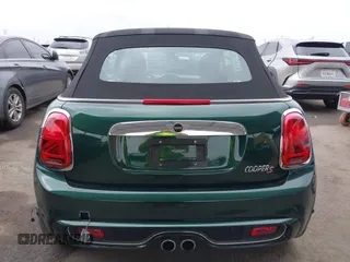2019 MINI Convertible Cooper S z VIN WMWWG9C5XK3E40620, wystawiony jako IAAI lot #42379122 z przebiegiem 5 496 mil mil oraz . Historia ofert i sprzedaży dostępna na DreamBid. Obrazek 16.