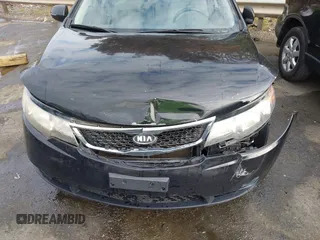 2013 Kia Forte EX with VIN KNAFU4A2XD5699665, listed as a IAAI auction lot 41910431 with 163,066 mi miles. Bid and sale history available at carsss.com. Image 6.