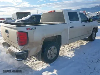 2014 Chevrolet Silverado 1500 LT with VIN 3GCUKREC0EG549588, listed as a IAAI auction lot 41370829 with 143,406 mi miles. Bid and sale history available at carsss.com. Image 4.
