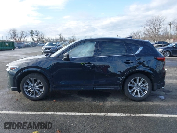 2024 Mazda CX-5 2.5 S Premium Package with VIN JM3KFBDM3R0400333, listed as a IAAI auction lot 41741454 with 14,116 mi miles. Bid and sale history available at carsss.com. Image 14.