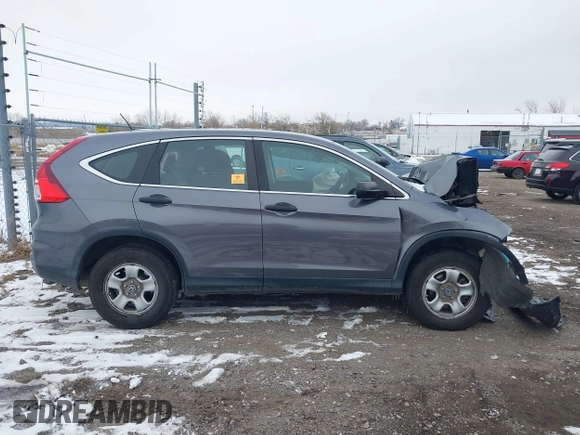 2015 Honda CR-V LX with VIN 2HKRM4H3XFH619055, listed as a IAAI auction lot 40989227 with 113,332 mi miles and . Bid and sale history available at DreamBid. Image 13.