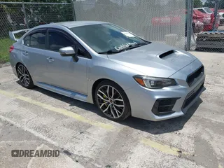 2021 Subaru WRX STI with VIN JF1VA2E66M9822014, listed as a IAAI auction lot 42499316 with 55,625 mi miles and . Bid and sale history available at DreamBid. Image 1.