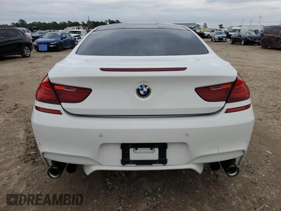 2014 BMW M6 z VIN WBSLX9C51ED160143, wystawiony jako Copart lot #88287015 z przebiegiem 91 717 mil mil oraz Szkoda całkowita • Salvage title. Historia ofert i sprzedaży dostępna na DreamBid. Obrazek 8.