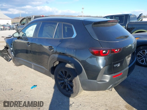 2023 Mazda CX-50 2.5 S Preferred Plus Package with VIN 7MMVABCM0PN138180, listed as a IAAI auction lot 41875179 with 33,652 mi miles. Bid and sale history available at carsss.com. Image 3.
