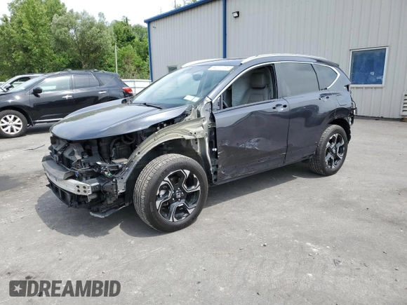 2018 Honda CR-V Touring with VIN 7FARW2H93JE048507, listed as a Copart auction lot 64071705 with 69,051 mi miles and Salvage title. Bid and sale history available at DreamBid. Image 1.