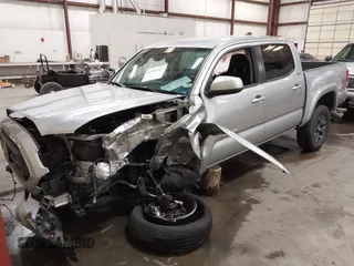 2023 Toyota Tacoma SR with VIN 3TMCZ5AN9PM604793, listed as a IAAI auction lot 42251347 with 39,741 mi miles and . Bid and sale history available at DreamBid. Image 2.