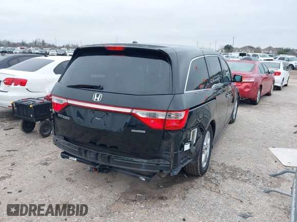 2013 Honda Odyssey Touring with VIN 5FNRL5H9XDB073706, listed as a IAAI auction lot 41591111 with 158,305 mi miles and . Bid and sale history available at carsss.com. Image 4.