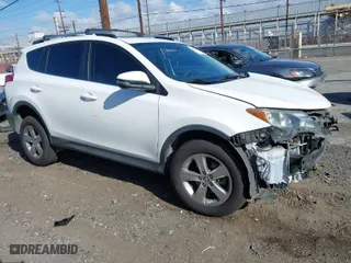 2015 Toyota RAV4 XLE with VIN JTMWFREV9FJ034992, listed as a IAAI auction lot 41922694 with 100,956 mi miles. Bid and sale history available at carsss.com. Image 1.