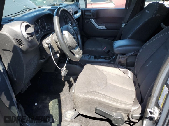 2017 Jeep Wrangler Unlimited Sahara with VIN 1C4BJWEG7HL552748, listed as a Copart auction lot 53086525 with 85,054 mi miles and Salvage title. Bid and sale history available at DreamBid. Image 7.